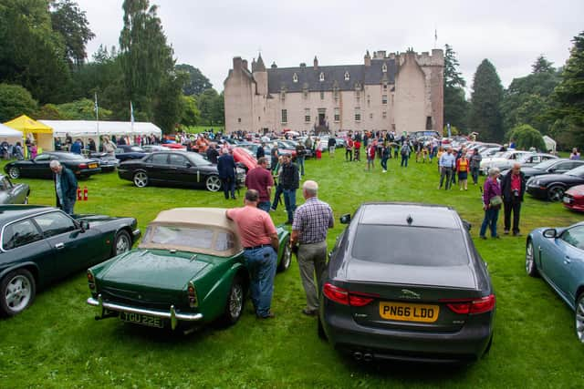 The Annual Gathering and Car Show showcases iconic Jaguars and Daimlers.