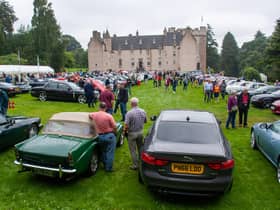 The Annual Gathering and Car Show showcases iconic Jaguars and Daimlers.