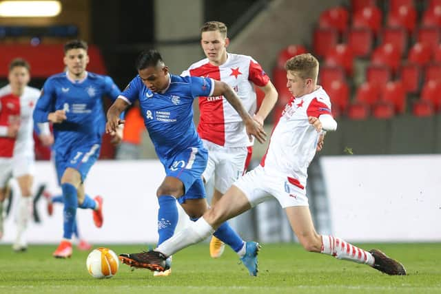 Slavia Prague's Czech defender David Zima (R) and Rangers' Colombian striker Alfredo Morelos vie for the ball during the UEFA Europa League, last 16, first Leg football match Slavia Prague v Rangers at the Eden Arena stadium in Prague, Czech Republic, on March 11, 2021. (Photo by Milan Kammermayer / AFP) (Photo by MILAN KAMMERMAYER/AFP via Getty Images)