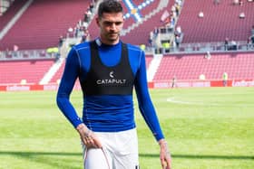 Lafferty has played for Rangers twice, and also at Hearts
