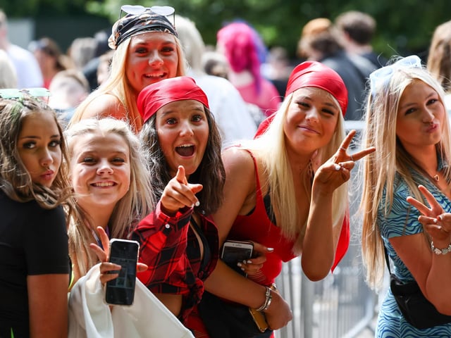 Festival goers arrive on day one (Photo by Jeff J Mitchell/Getty Images)
