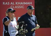 David Drysadale and wife/caddie Vicky discuss his tee shot on the 15th hole during day one of the Ras Al Khaimah Classic at Al Hamra Golf Club. Picture: Ross Kinnaird/Getty Images.