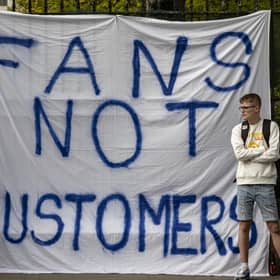 Fans of Chelsea Football Club protest against the European Super League outside Stamford Bridge