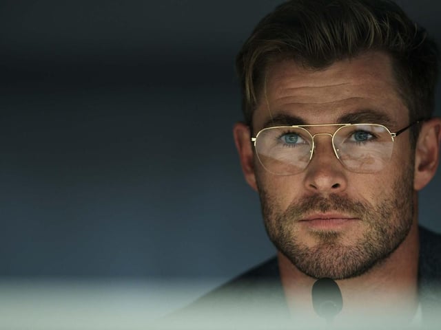 Chris Hemsworth plays Abnesti in Netflix's new hit Spiderhead, which sees two inmates form a connection as they battle with their pasts in a state-of-the-art penitentiary run by a visionary who experiments on his subjects with mind-altering drugs.
