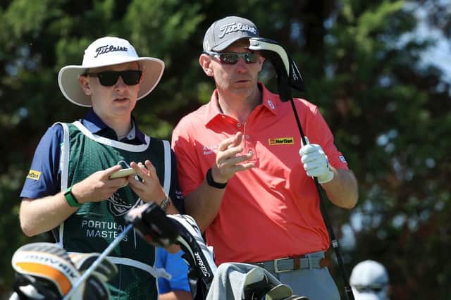 Stephen Gallacher, pictured with his son/caddie Jack in the Portugal Masters, has launched a Christmas fund-raiser through his Foundation. Picture: Andrew Redington/Getty Images