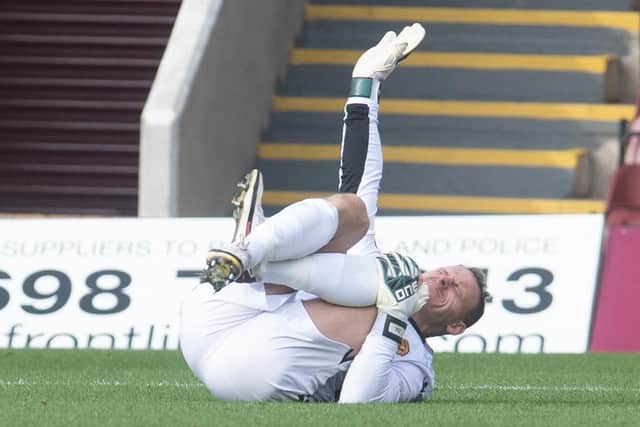 Trevor Carson will get a scan after the Motherwell goalkeeper picked up an injury.