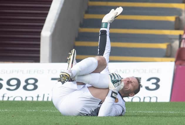 Trevor Carson will get a scan after the Motherwell goalkeeper picked up an injury.