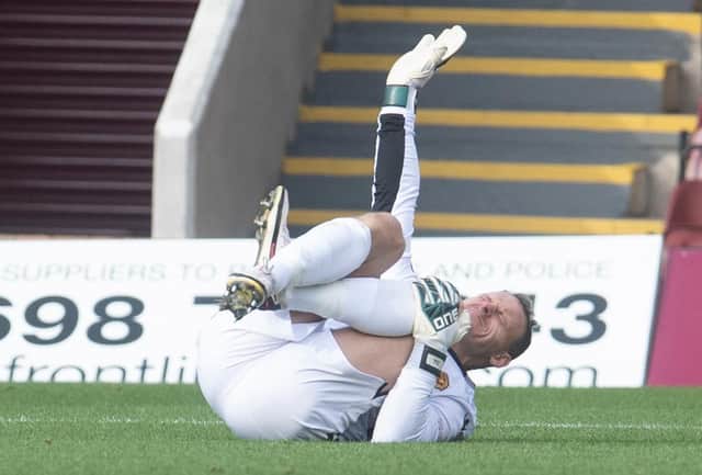 Trevor Carson will get a scan after the Motherwell goalkeeper picked up an injury.