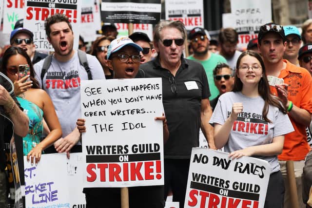 Members of the Writers Guild of America East are joined by SAG-AFTRA members as they picket at the Warner Bros. Discovery NYC office. Picture: Michael M. Santiago/Getty Images