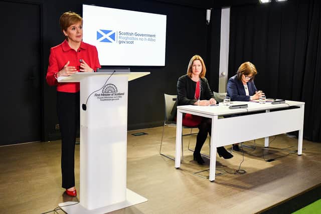 Scotland's then Chief Medical Officer, Dr Catherine Calderwood, centre, looks on as Nicola Sturgeon gives a Covid briefing in March 2020 (Picture: Jeff J Mitchell/Getty Images)
