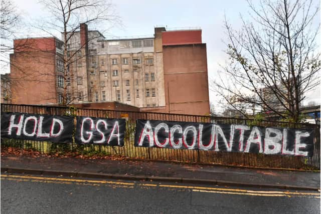 Students protested outside GSA on Monday.
