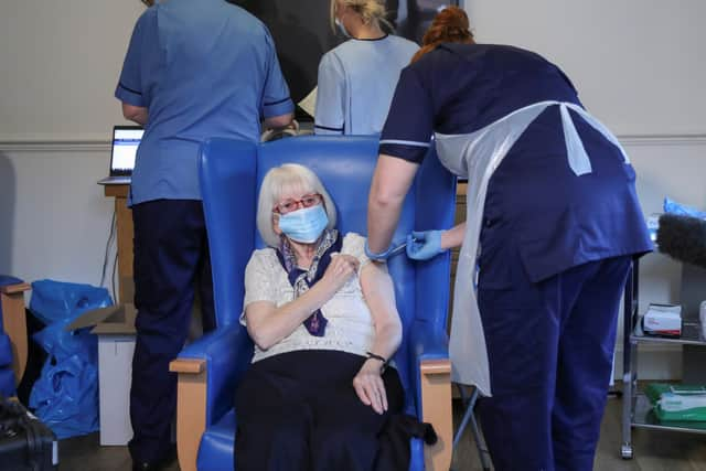 Resident Margaret Keating, 88, receiving the Pfizer/BioNTech COVID-19 vaccine at the Abercorn House Care Home in Hamilton.