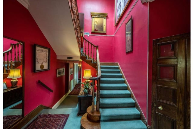 Stairs leading up to the first floor of the house - featuring eleven generously sized bedrooms, two dressing rooms and six bathrooms.