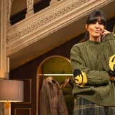 Claudia wears green cable jumper with smiley face elbows, £480 from Japanese menswear brand Kapital; kilt style skirt, £259, from Brora; and Dr Martens hi-top Chelsea boots, £180. From The Traitors II, Credit: BBC/Studio Lambert/LLARA PLAZA