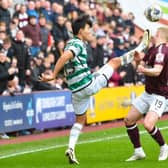 Celtic's Yang Hyun-jun fouls Hearts' Alex Cochrane with a high foot which led to a red card following a VAR check. (Photo by Paul Byars / SNS Group)