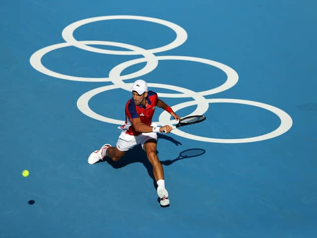Novak Djokovic in action during his Men's Singles First Round match against Hugo Dellien at Ariake Tennis Park