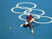 Novak Djokovic in action during his Men's Singles First Round match against Hugo Dellien at Ariake Tennis Park