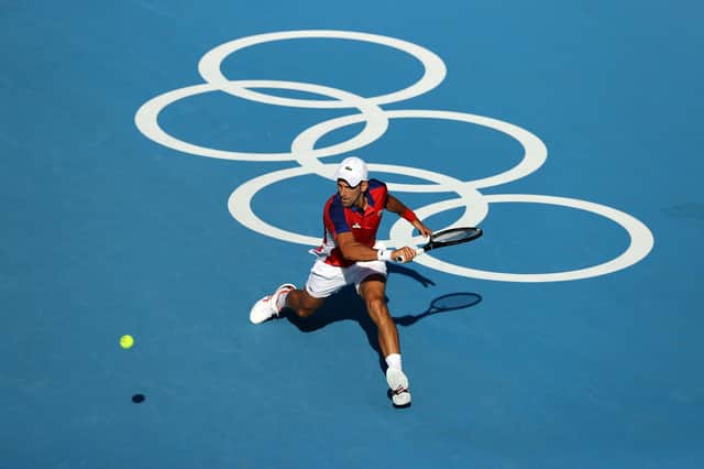 Novak Djokovic in action during his Men's Singles First Round match against Hugo Dellien at Ariake Tennis Park