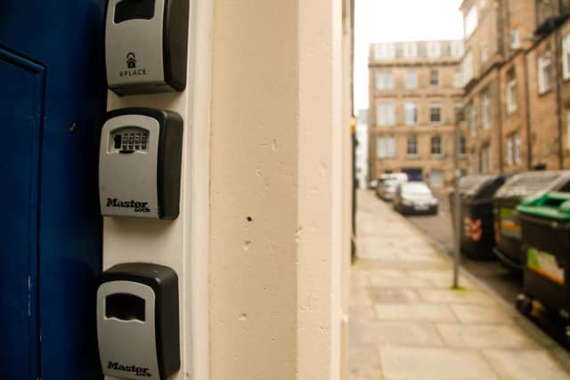 Key safes for short-term lets in tenement flats reveal the extent of the problem in Edinburgh. Picture: Scott Louden