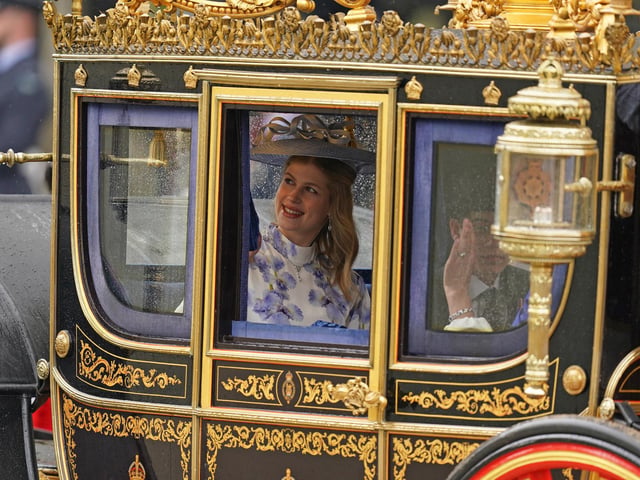 Lady Louise Windsor returns to Buckingham Palace by coach following the coronation ceremony of King Charles III and Queen Camilla in central London.