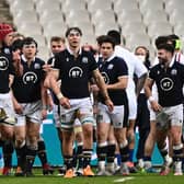 Scotland's players celebrate Dave Cherry's try