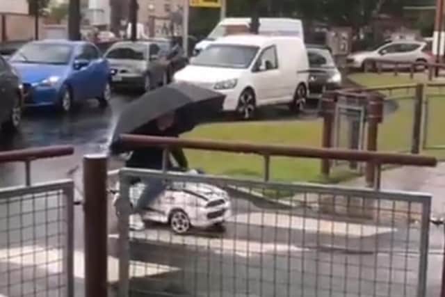 Rory Barraclough queuing outside the McDonald's branch in Pollokshaws footage: Pure Radio