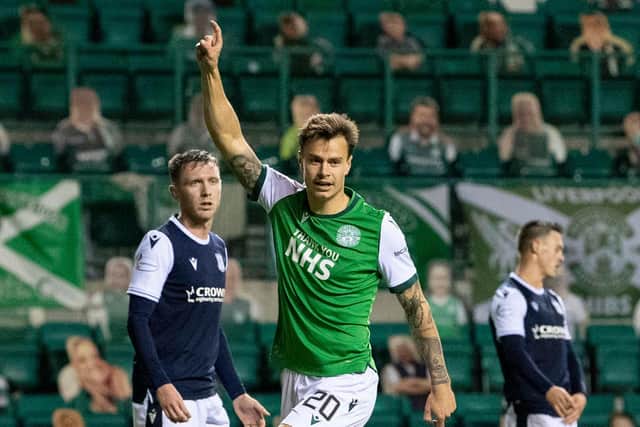Melker Hallberg celebrates Hibs' fourth goal.