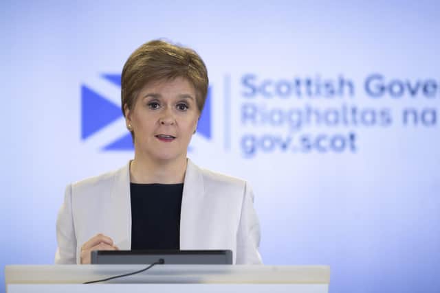 Nicola Sturgeon at the podium in 2020 for a Covid briefing. Picture: Jane Barlow/WPA Pool/Getty Images