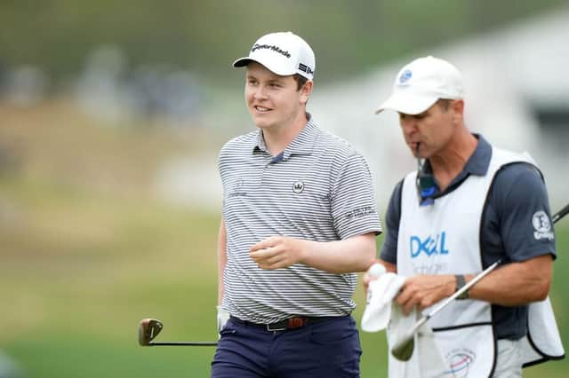 Bob MacIntyre flashes a smile after holing a bunker shot on the 16th in his match against Kevin Na on the opening day of the World Golf Championships-Dell Technologies Match Play at Austin Country Club in  Texas. Picture: Darren Carroll/Getty Images.