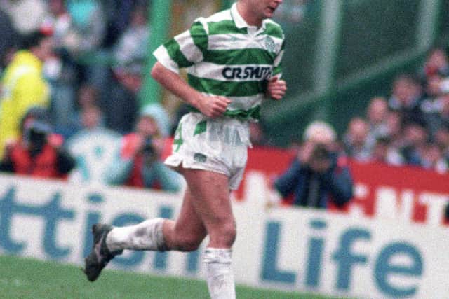 Celtic's Peter Grant heads for the dressing room after being shown the red card for encroaching at a free kick. He had been booked for the foul on Mo Johnston