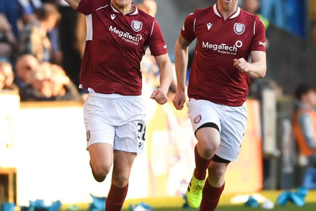 Arbroath's James Craigen (L) celebrates making it 1-0 during a cinch Championship match between Kilmarnock and Arbroath at Rugby Park.  (Photo by Craig Foy / SNS Group)