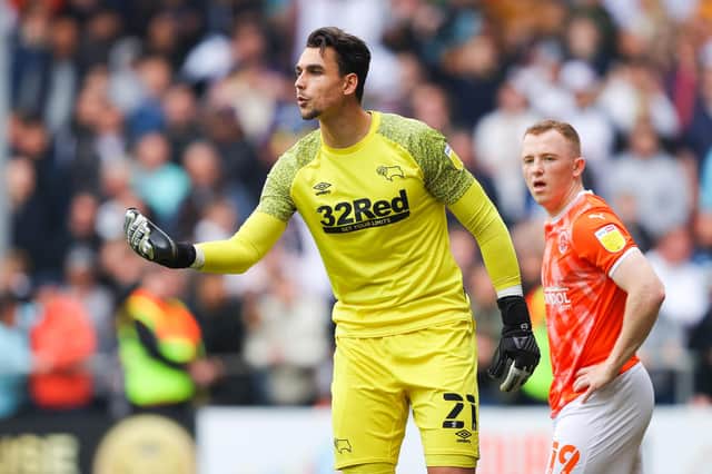Former Derby goalkeeper Kelle Roos has joined Aberdeen.