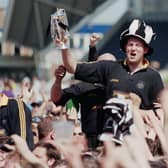 Doddie Weir is chaired off by Newcastle Falcons fans after helping the club win the Premiership title in 1997/98. Picture: Tom Shaw/Allsport/Getty Images/Hulton Archive