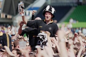 Doddie Weir is chaired off by Newcastle Falcons fans after helping the club win the Premiership title in 1997/98. Picture: Tom Shaw/Allsport/Getty Images/Hulton Archive