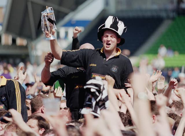 Doddie Weir is chaired off by Newcastle Falcons fans after helping the club win the Premiership title in 1997/98. Picture: Tom Shaw/Allsport/Getty Images/Hulton Archive