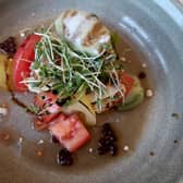 Heritage tomato and scorched rosary goat's cheese salad.