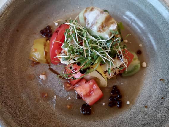 Heritage tomato and scorched rosary goat's cheese salad.
