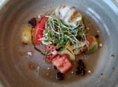 Heritage tomato and scorched rosary goat's cheese salad.