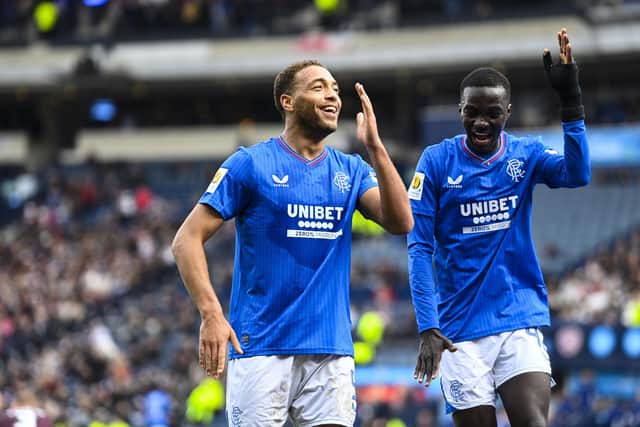 Dessers celebrates with Mohamed Diomande after securing a date with Celtic in next month's final.