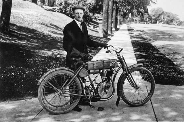 Walter Davidson pictured with one of the first motorcyles devised by his brother Arthur and his childhood friend Bill Harley. PIC Wikipedia