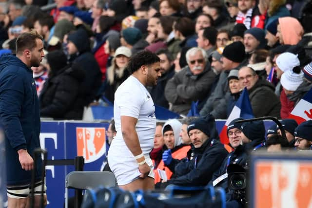 France's tight head prop Mohamed Haouas (C) walks off the pitch after being issued with a red card by Georgian referee Nika Amashukeli during the Six Nations match against Scotland at the Stade de France. (Photo by FRANCK FIFE/AFP via Getty Images)