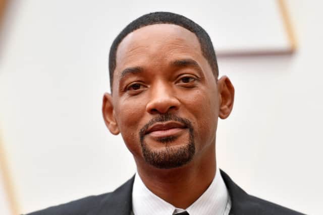 Will Smith arrives at the now infamous 94th Oscars in Hollywood  - he has now resigned from the Academy after slapping host Chris Rock during the ceremony.
(Photo by ANGELA WEISS/AFP via Getty Images)