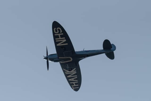 Spitfire flying over Dundee with a message of thanks to the NHS picture: Craig Chalmers @Cchalmersphoto