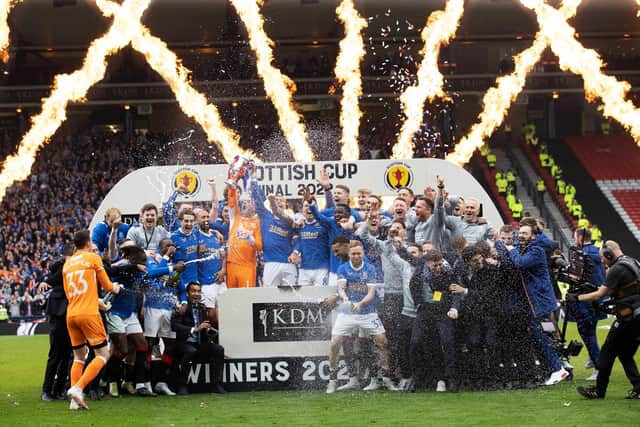 Rangers captain James Tavernier lifts the Scottish Cup after defeating Hearts.