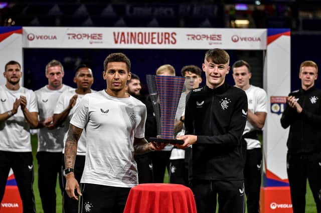 Rangers captain James Tavernier and young defender Nathan Patterson with the Veolia Trophy after the win over Nice.