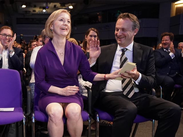 Liz Truss with her husband Hugh O'Leary, at the Queen Elizabeth II Centre in London as it was announced that she is the new Conservative party leader, and will become the next Prime Minister. Picture date: Monday September 5, 2022.