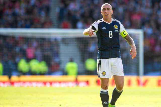 Scott Brown in action for Scotland against England at Hampden Park