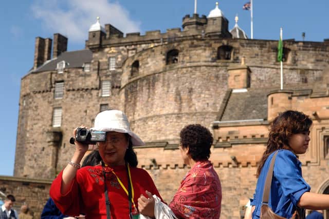 Tourists visiting Edinburgh Castle. Edinburgh's Visitor Levy is expected to see tourists charged 4 per cent on the cost of their accommodation.