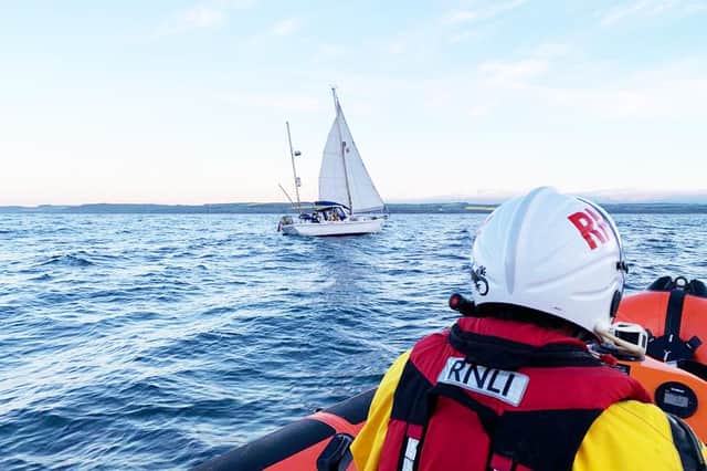The RNLI Stonehaven crew arrives at the scene (Photo: RNLI).