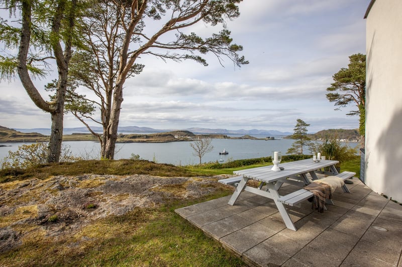 The patio area is ideal for watching the boats sail along the water